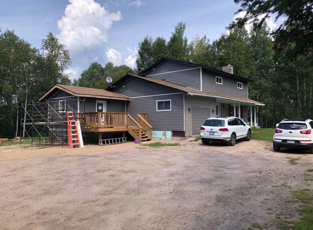 North Bay second-storey addition with matched roofline.