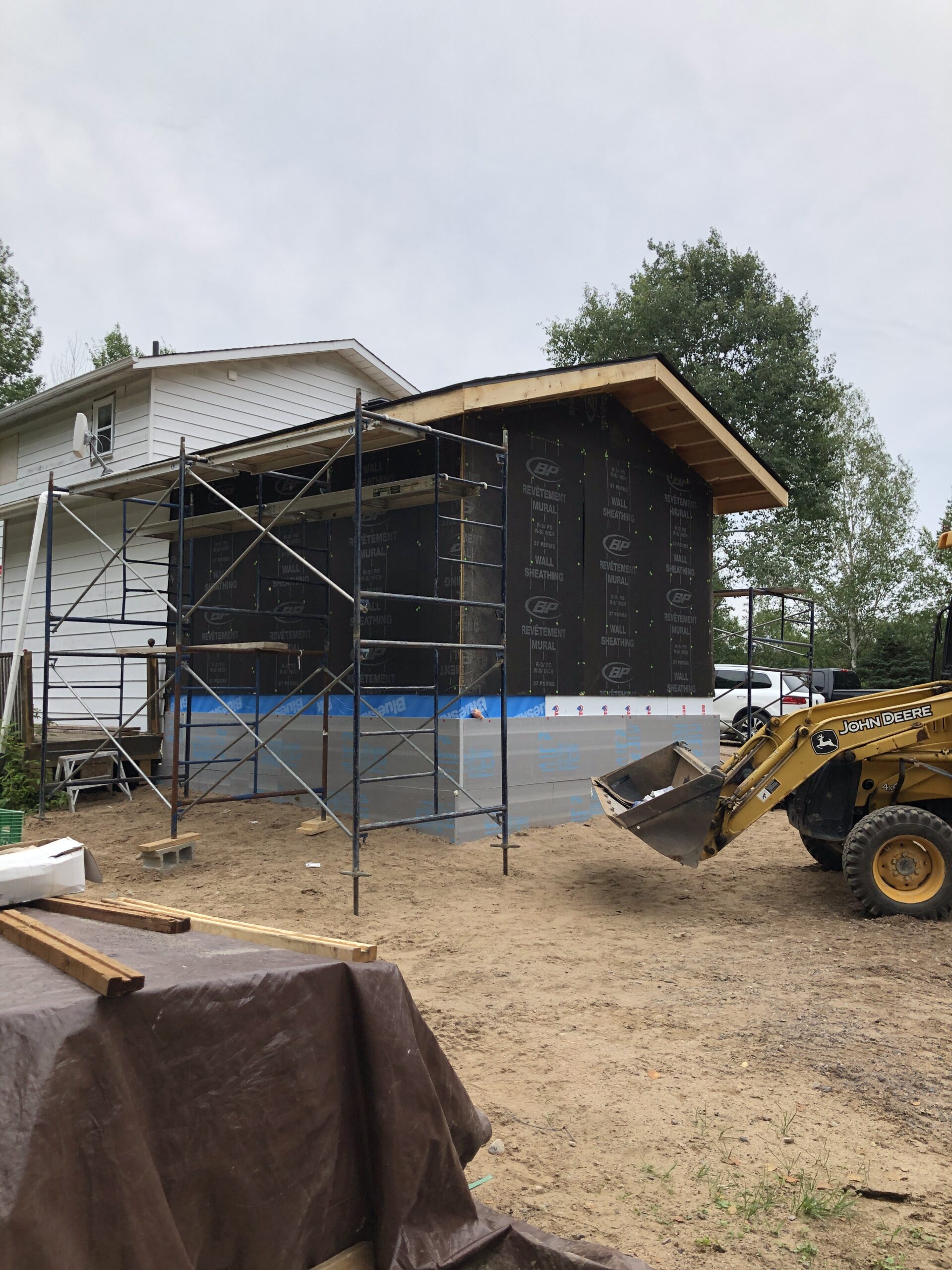 North Bay second-storey addition with matched roofline.