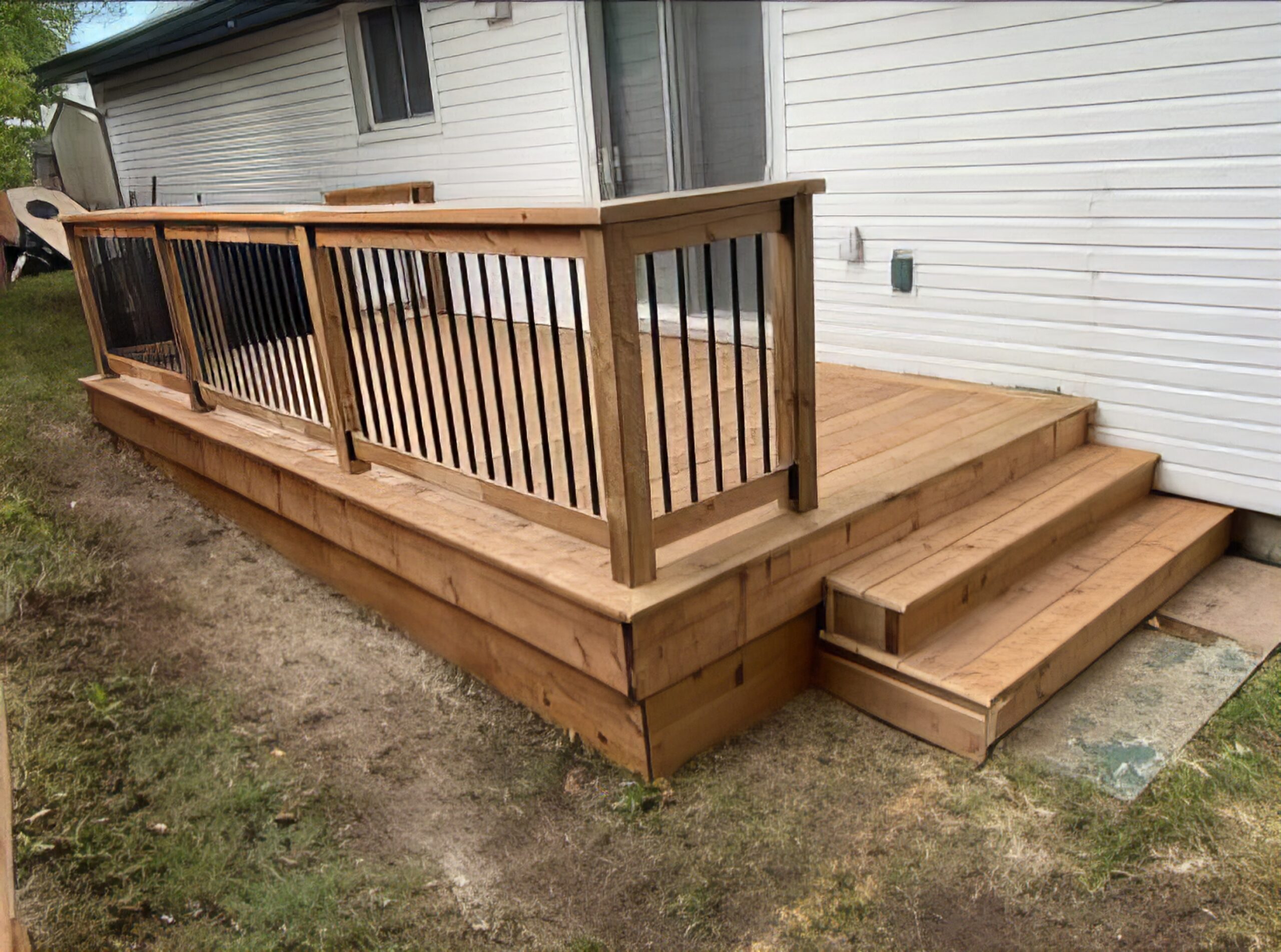Durable deck surface and railing system built for North Bay climate with weather-resistant materials and professional design