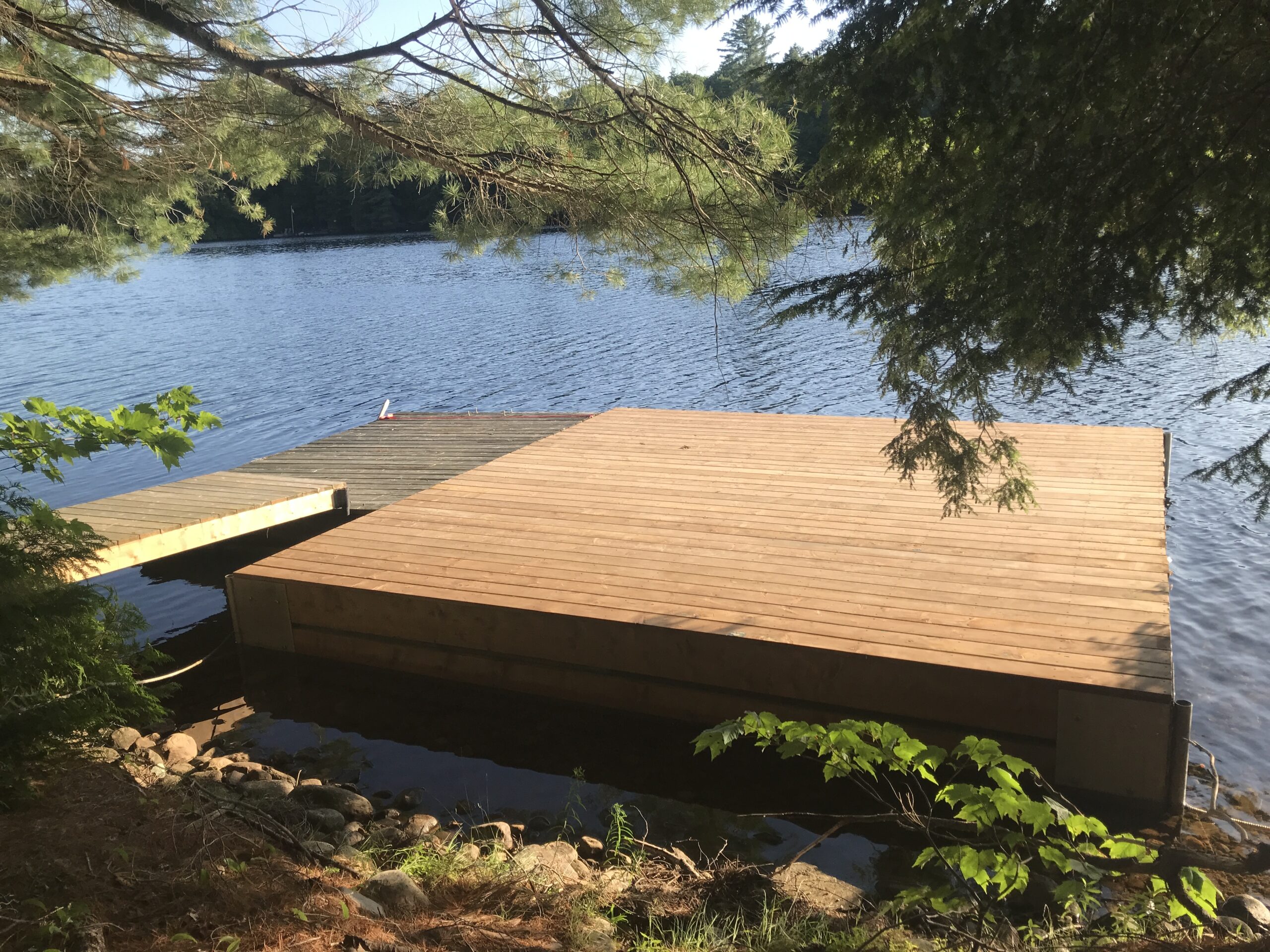 Hidden water protection and moisture barrier installed under a deck in North Bay to prevent rot and structural damage